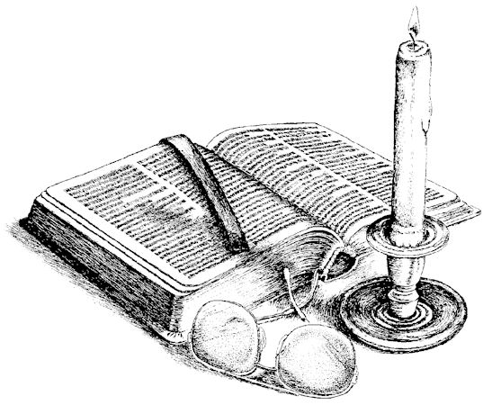 Bible with lit candle